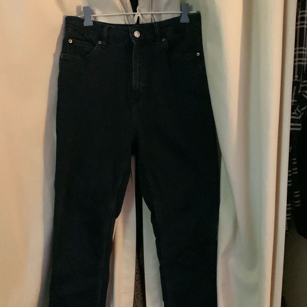 H&M Size 12 black high-waisted jeans.